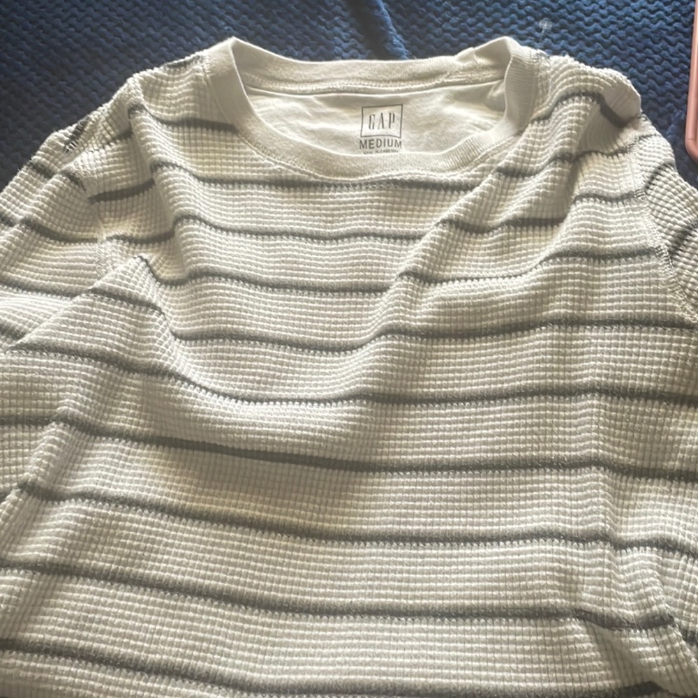 A grey men gaps long sleeve shirt. Never worn